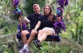 Traveler enjoying the Bali Swing Ubud overlooking lush jungle scenery